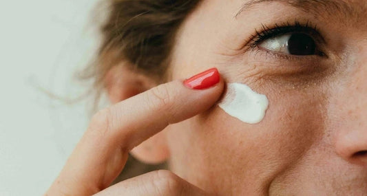woman applying a clay mask for oily skin purification